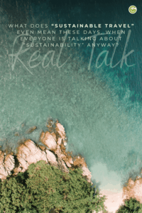 A turquoise sea borders a rocky coastline covered in green vegetation. In the upper part, white and turquoise text appears on the water. 
