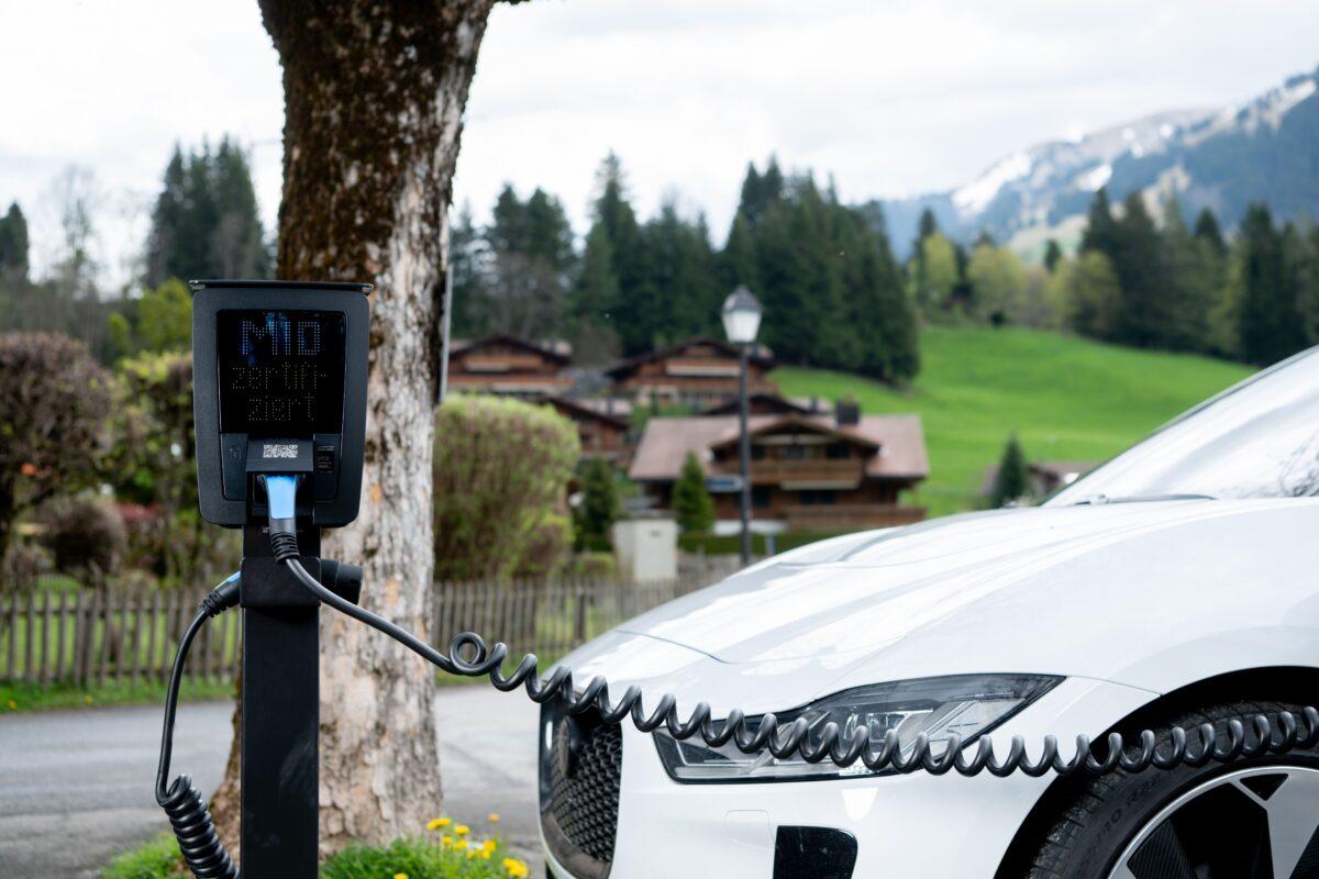 electric car on the e-charging in the alps